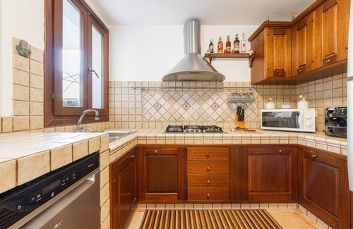 Teulada Apartment | Apartment 'Casa Vacanze Lilly' with Private Garden, Wi-Fi and Air Conditioning