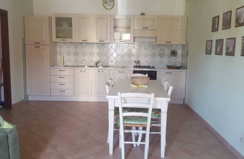 La Maddalena Apartment | Apartment "Cavalluccio 2 La Maddalena " with Shared Terrace, Wi-Fi & A/C