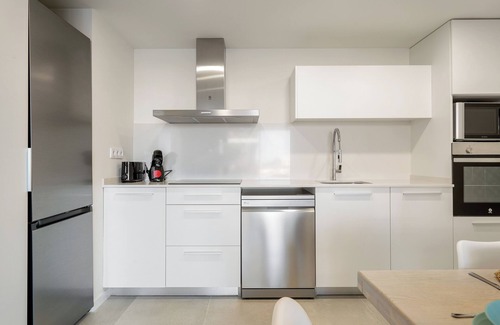Calafell Apartment | Apartment 'Costa Dorada Perle' with Sea View, Shared Pool and Air Conditioning