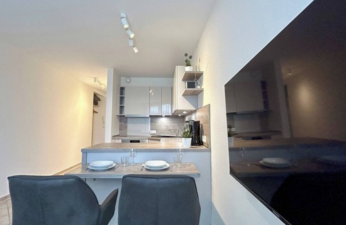 Duhnen Apartment | Apartment directly behind the dike for 2 persons, swimming pool, whirlpool, sauna