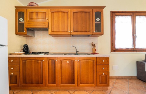 Porto Pino Apartment | Apartment 'Ella' with Private Terrace, Private Garden and Balcony