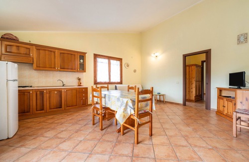 Porto Pino Apartment | Apartment 'Ella' with Private Terrace, Private Garden and Balcony