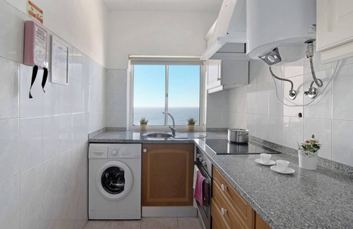 Armacao de Pera Apartment | Apartment Estrela 606 - Vista Mar on the Beach with Sea View, Pool, Wi-Fi, Garden & Balcony