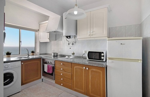 Armacao de Pera Apartment | Apartment Estrela 606 - Vista Mar on the Beach with Sea View, Pool, Wi-Fi, Garden & Balcony