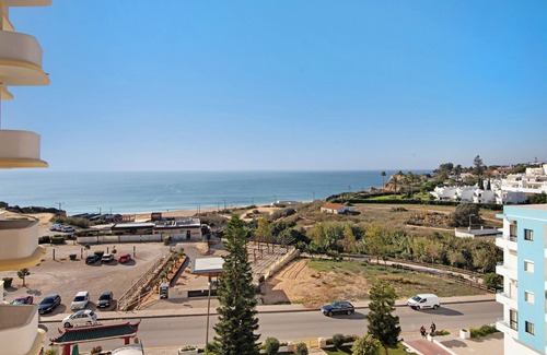 Armacao de Pera Apartment | Apartment Estrela 606 - Vista Mar on the Beach with Sea View, Pool, Wi-Fi, Garden & Balcony