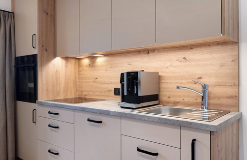 Daunei Apartment | Apartment 'Fën' with Mountain View, Shared Garden and Wi-Fi