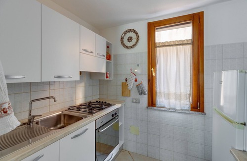 Cabras Apartment | Apartment 'Flamingo House' with Balcony, Wi-Fi and Air Conditioning