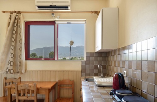 Tingaki Apartment | Apartment 'Golden Sun Two-bedroom Apt 2' with Sea View, Shared Pool and Wi-Fi