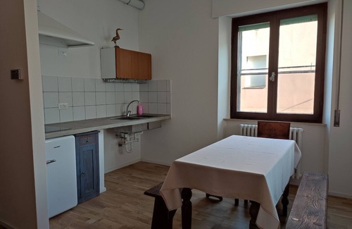 Fermo Apartment | Apartment 'Hoarder's Home Gallery' with Private Terrace, Private Garden and Air Conditioning