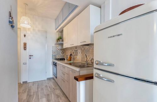 Stintino Apartment | Apartment 'Il Pesce Innamorato - Stintino' with Sea View and Private Terrace