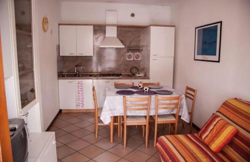 Rosapineta Apartment | Apartment in a residence with pool in Rosolina