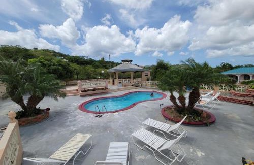 Grove Place Apartment | Apartment in Fredriksted With Pool -Tiffany's Place at The Green Castle