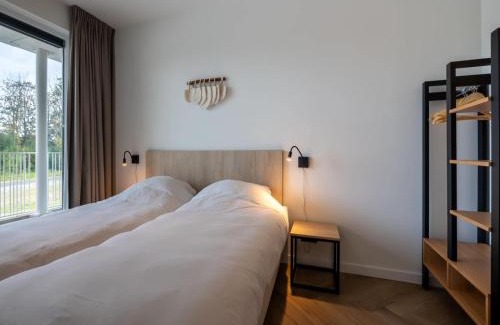 Oranjeplaat House | Apartment in Zeeland with Marina and Views, cleaning included
