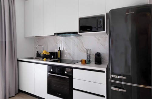 Nikiana Apartment | Apartment 'Mella Roa Emer' with Sea View, Wi-Fi and Air Conditioning