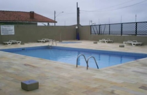 Centro Apartment | Apartment on the beach, walk in the sand in Itanhaem, with pool and sea view