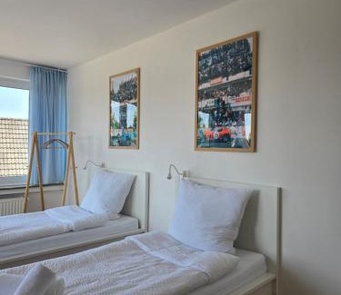 Ibbenbueren Apartment | APARTMENT PD23 ALTE FEUERWACHE I Ganze Wohnung I 5 Einzelbetten I 3 Zimmer I 3min CityHospital I 50m Supermarkt I Küche I SmartTV