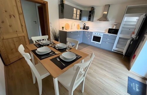 Friesenried Apartment | Apartment 'Sonnenstrahl' with Shared Garden, Balcony and Wi-Fi