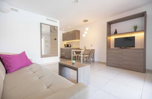 Cala Agulla Apartment | Apartment 'Standard 1' with Shared Pool, Wi-Fi and Air Conditioning