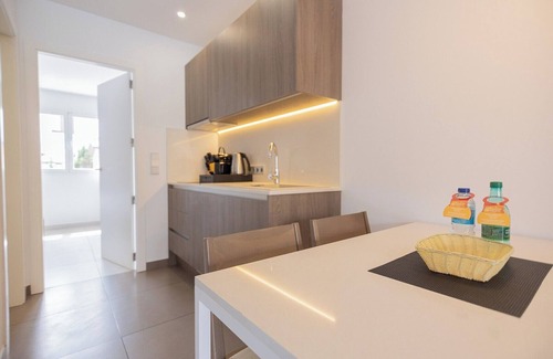 Cala Agulla Apartment | Apartment 'Standard 1' with Shared Pool, Wi-Fi and Air Conditioning