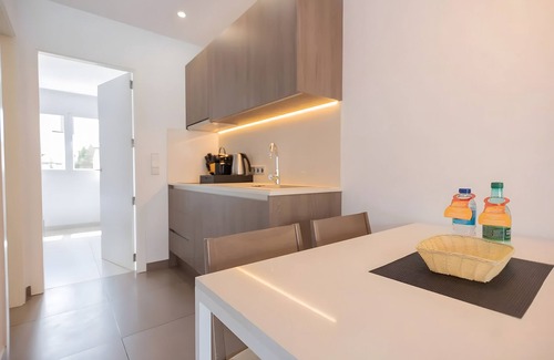 Cala Agulla Apartment | Apartment 'Standard 7' with Shared Pool, Wi-Fi and Air Conditioning