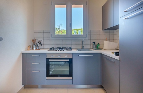 Aglientu Apartment | Apartment 'Sughereto 1' with Sea View, Wi-Fi and Air Conditioning