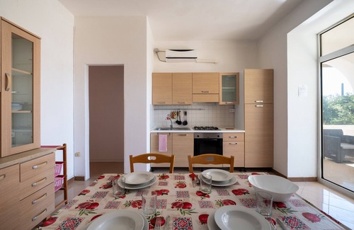 Punta Prosciutto Apartment | Apartment 'Villa Ada Rosa' with Private Terrace, Wi-Fi and Air Conditioning