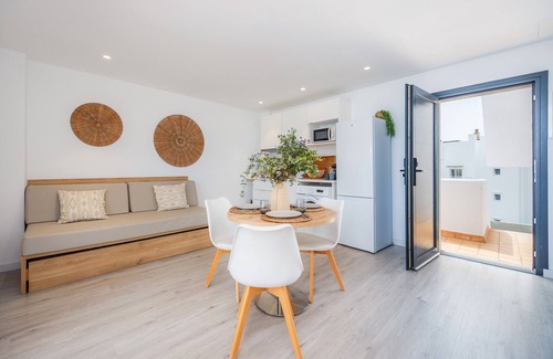 Cala d'Or Apartment | Apartment 'White Suites' with Shared Pool, Wi-Fi and Air Conditioning