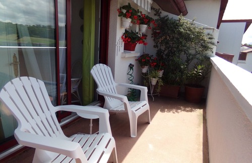 Saint-Jean-de-Luz Apartment | Apartment with sunny terrace with view of the montain, river and golf. Near the beach, center city and train station