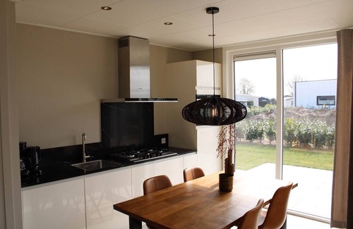 Lathum Ski Chalet | Apartment with Sauna and Terrace in Gelderland