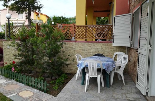 Badesi Apartment | APARTMENT WITH VERANDA AND GARDEN + FERRY UNDER COST