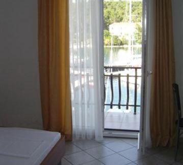 Vrboska Apartment | Apartments Dora, with a beautiful view of the bay, near the sea and center