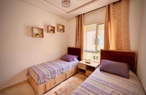 Bouznika Apartment | Appartement lumineux vue sur piscine, 4 min de la Plage