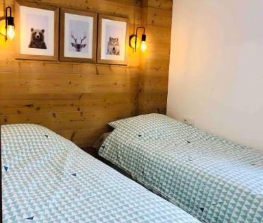 Genos Apartment | Appartement T4 8 couchages spacieux et cosy au pied des pistes