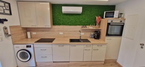Posing Apartment | Appartment-Ferienwohnung mit Küche, Bad, WLAN, Klimaanlage, Modern eingerichtet