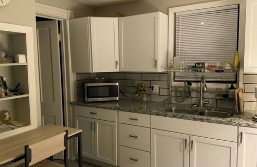 Sharon Apartment | Apt A The Yellow Shuttered House