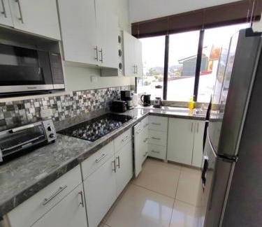 Ciudad Cariari Apartment | Apt Morpho Cas'Aguacate close to Airport, Pedregal, Centro Convenciones