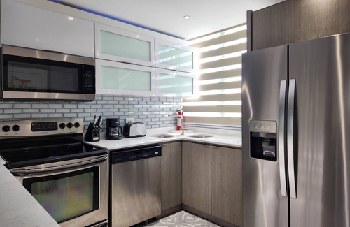 Las Carreras Apartment | Aquatika Minimalist Penthouse/roof top/Beach/Pools/20 mins to El Yunque