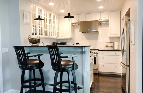 Isanti House | Architectural lake home with a monthly discount