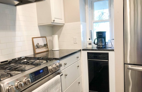 Isanti House | Architectural lake home with a monthly discount