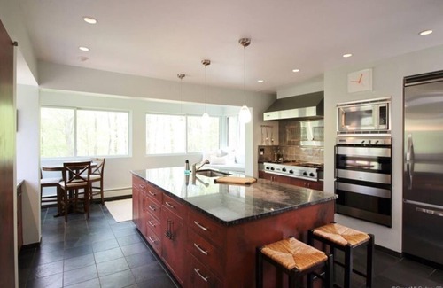 Redding Ridge House | Architectural woodland retreat with trails, sauna, theater