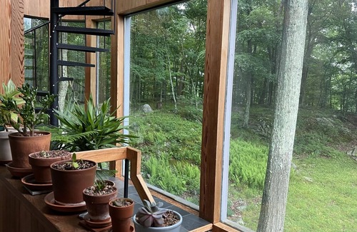 Redding Ridge House | Architectural woodland retreat with trails, sauna, theater