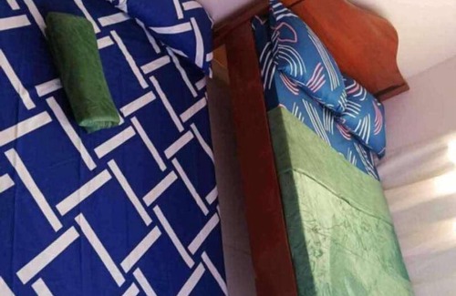 San Juan Bed & Breakfast | Aremen Transient, Nipa Hut with shared main house's bathroom