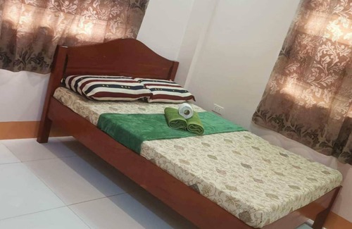 San Juan Bed & Breakfast | Aremen Transient, Nipa Hut with shared main house's bathroom
