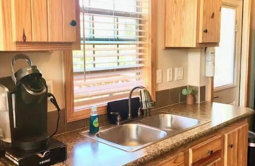 Austin Cabin | Armadillo cabin in a boutique gated tiny home resort with pool!