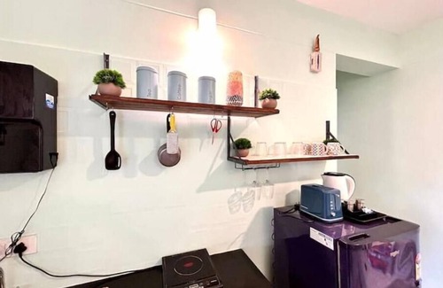 Grand Morrod Apartment | Around The World 1BHK w pool at Arpora by Slow Stays