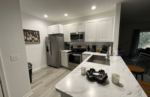 Riverview Condo | Artful Haven: A Stylish Escape