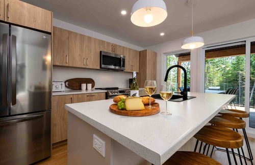 Les Eboulements Ski Chalet | Aspen 88 | Peaceful forest setting with spa