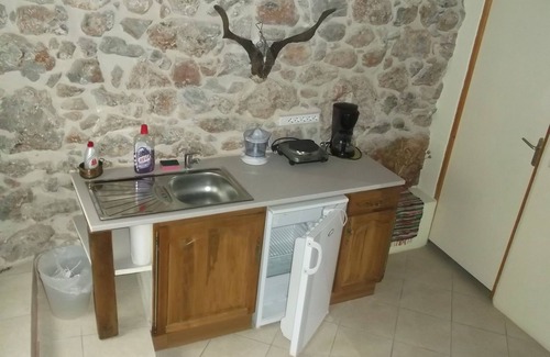 Leonidio House | At the foot of the red cliff. Leonidio. Greece.