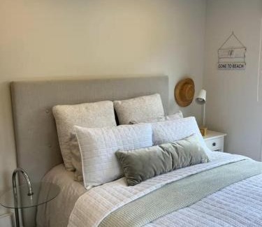 Castor Bay House | Auckland Coastal Hideaway Castor Bay Beach