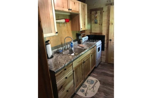 Northome Cabin | Authentic Log Cabin Island Lake Pet Friendly Northshore Bay Resort
